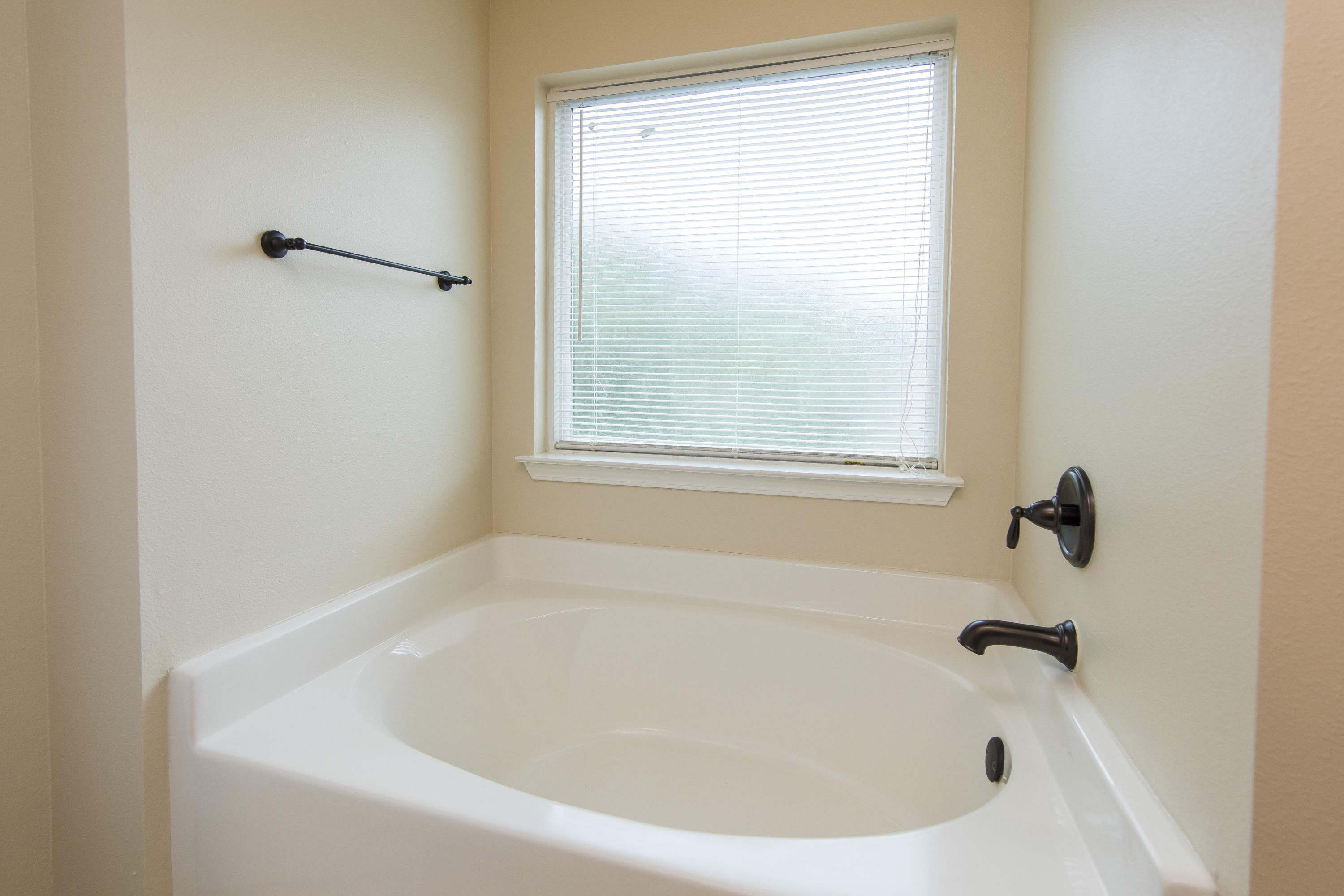 48 Topside Drive Inlet Beach, FL 32461 - Photo 18 of 30 a white bath tub sitting next to a window