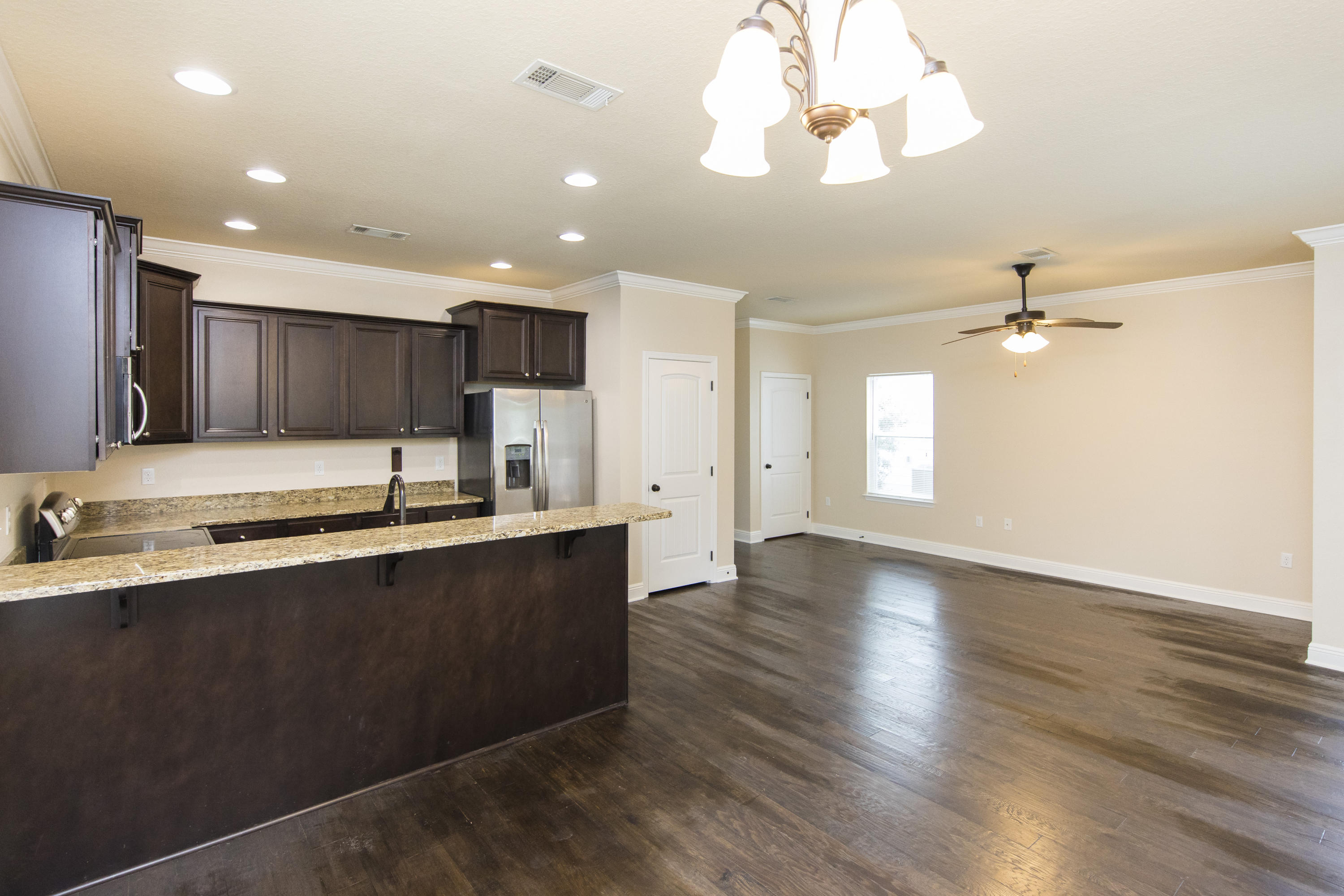 48 Topside Drive Inlet Beach, FL 32461 - Photo 4 of 30 a view of a kitchen with a sink and refrigerator