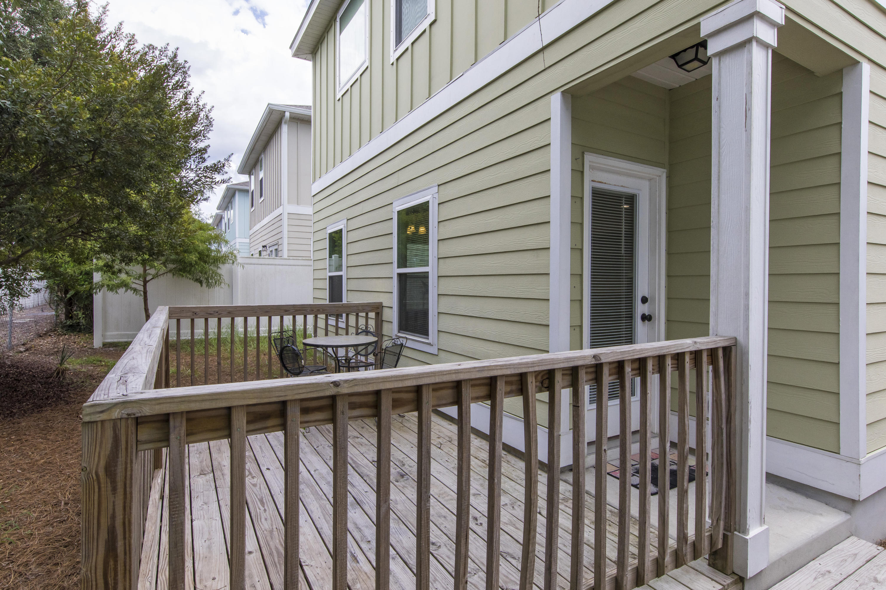 48 Topside Drive Inlet Beach, FL 32461 - Photo 10 of 30 a view of a balcony with a swing