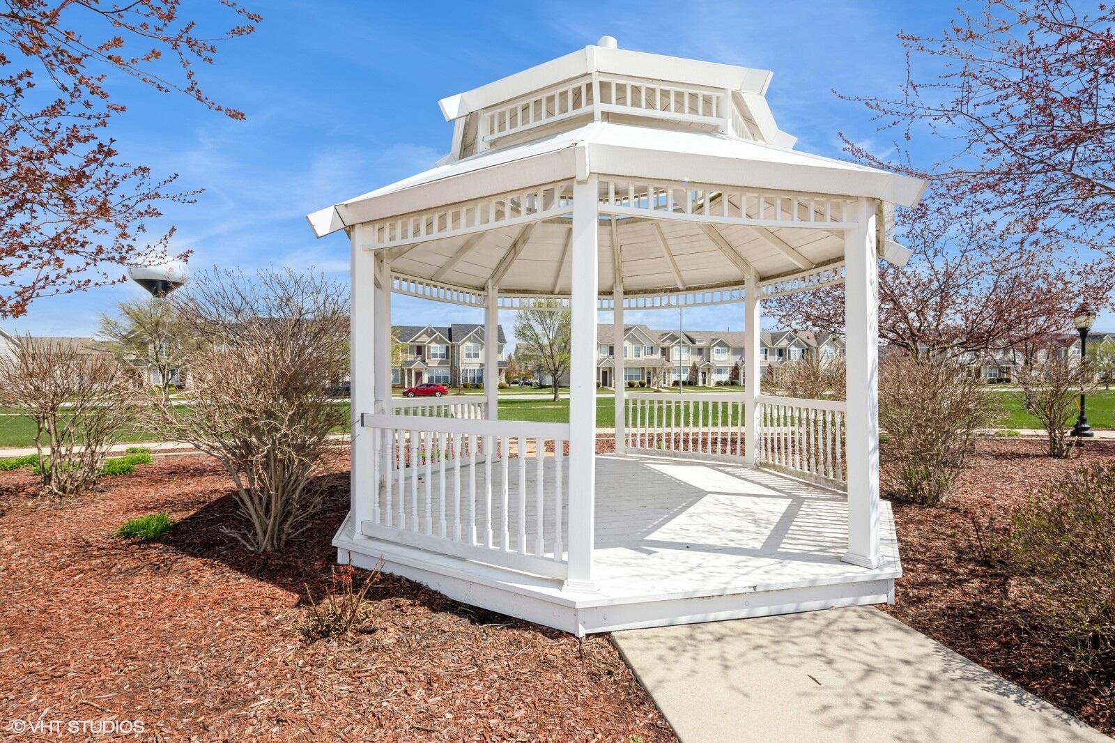 1078 East 114th Avenue Crown Point, IN 46307 - Photo 18 of 20 a view of a house with a yard