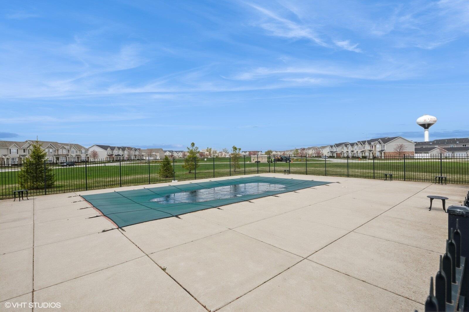 1078 East 114th Avenue Crown Point, IN 46307 - Photo 20 of 20 an outdoor view with swimming pool and mountain in the back