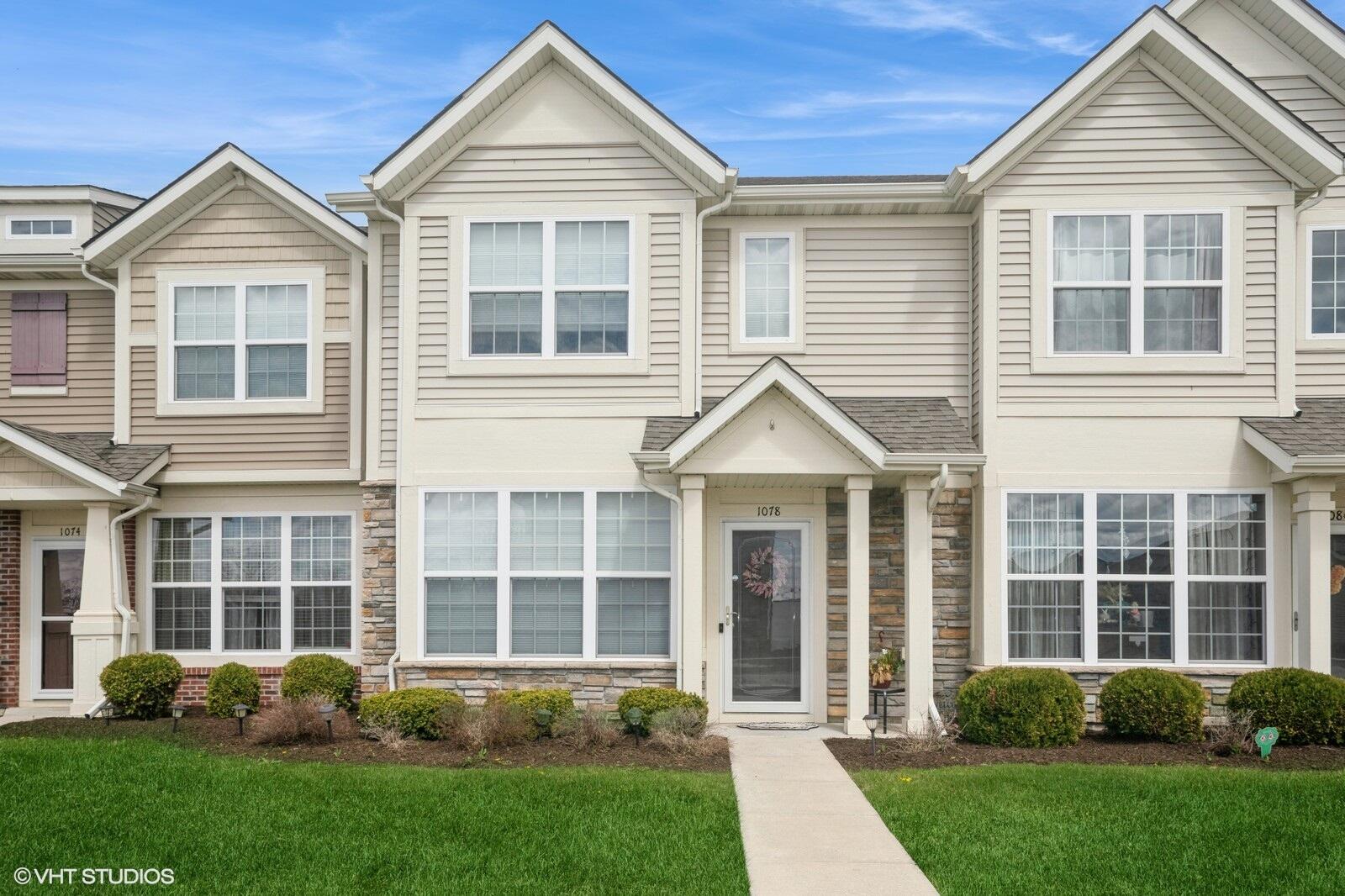 1078 East 114th Avenue Crown Point, IN 46307 - Photo 2 of 20 a front view of a house with a yard