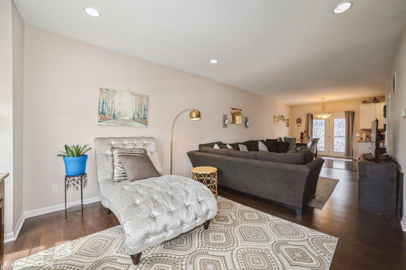 1078 East 114th Avenue Crown Point, IN 46307 - Photo 5 of 20 a living room with furniture and a wooden floor