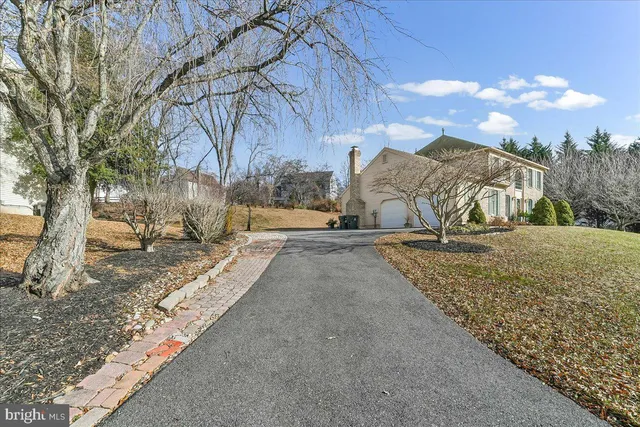 a view of a chairs and table on the wooden floor