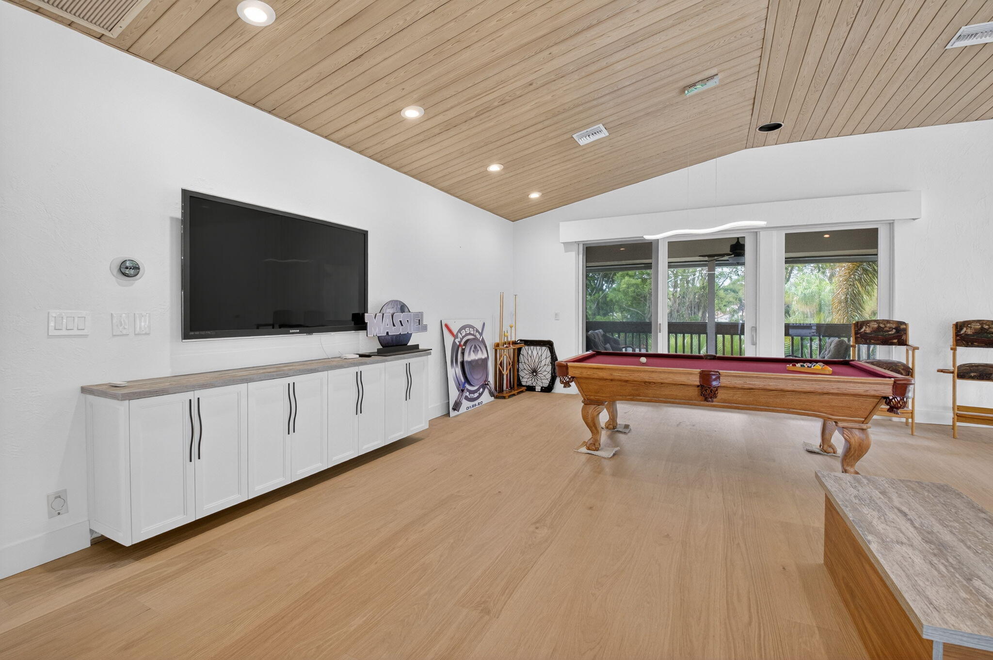 19787 Oakbrook Circle Boca Raton, FL 33434 - Photo 30 of 84 a living room with furniture and flat screen tv