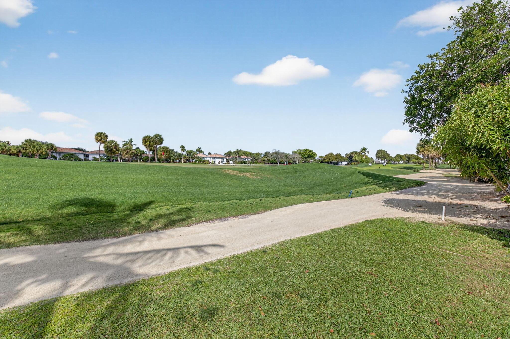19787 Oakbrook Circle Boca Raton, FL 33434 - Photo 42 of 84 a view of a golf course with a lake