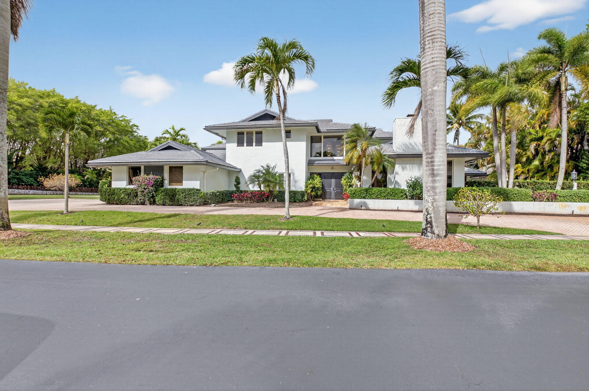 19787 Oakbrook Circle Boca Raton, FL 33434 - Photo 45 of 84 a view of a house with a yard and plants