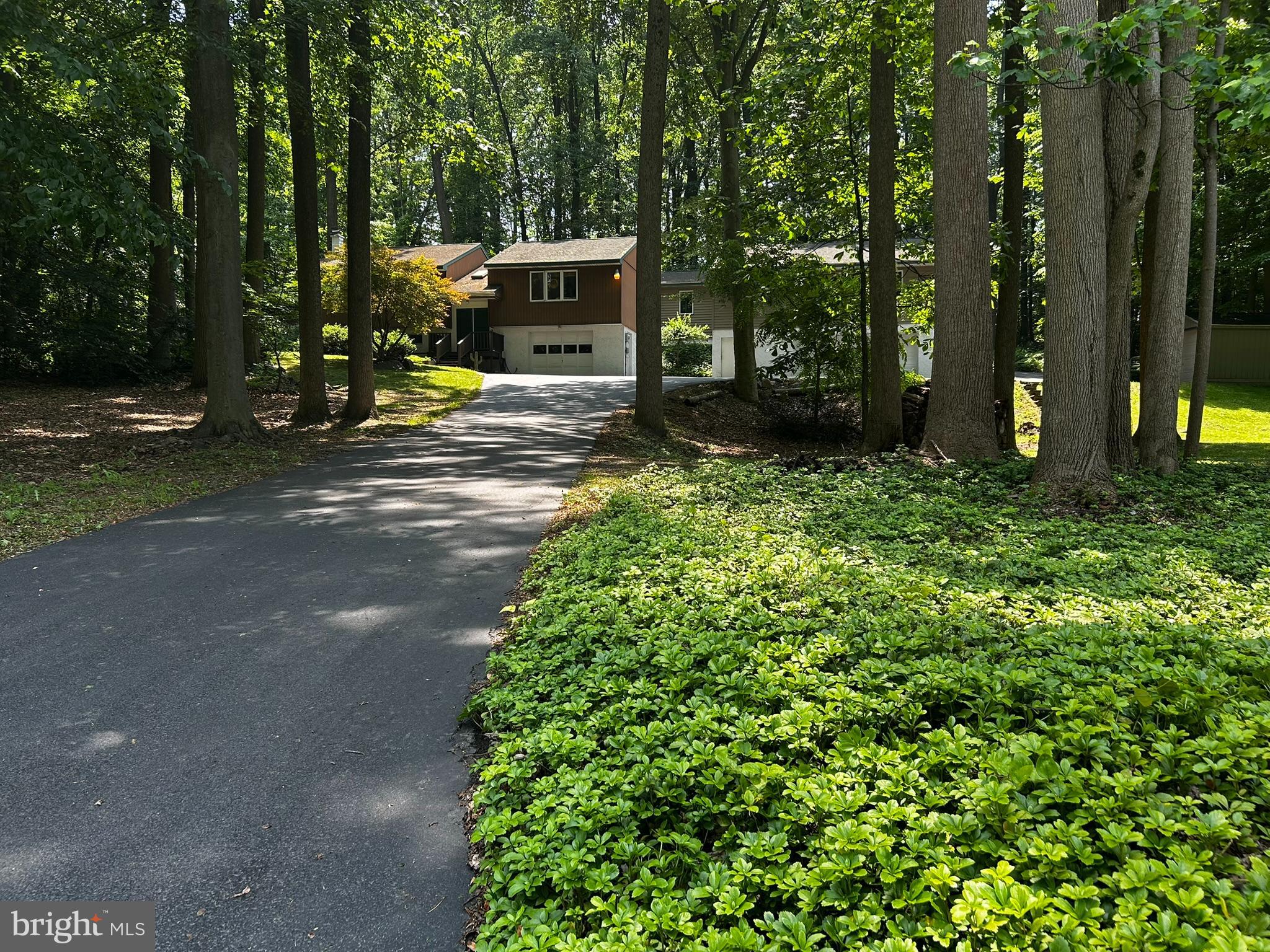 2140 Beaver Dam Road Honey Brook, PA 19344 - Photo 11 of 45 a garden view with a seating space