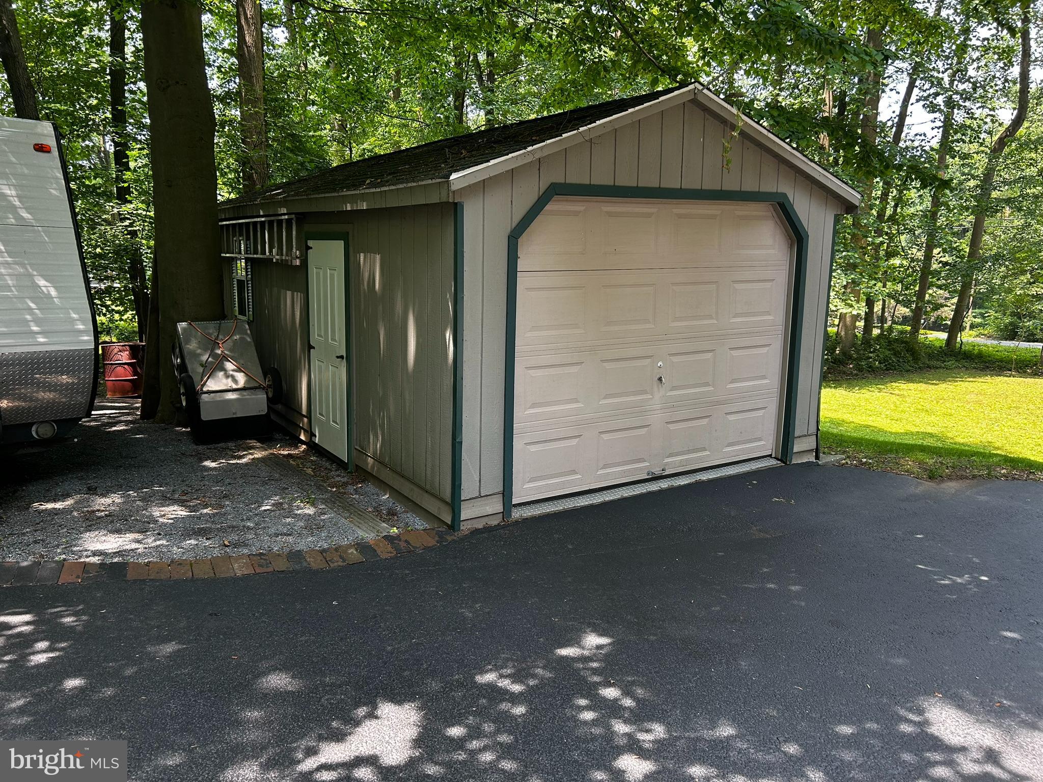 2140 Beaver Dam Road Honey Brook, PA 19344 - Photo 13 of 45 a front view of a house with a yard and garage