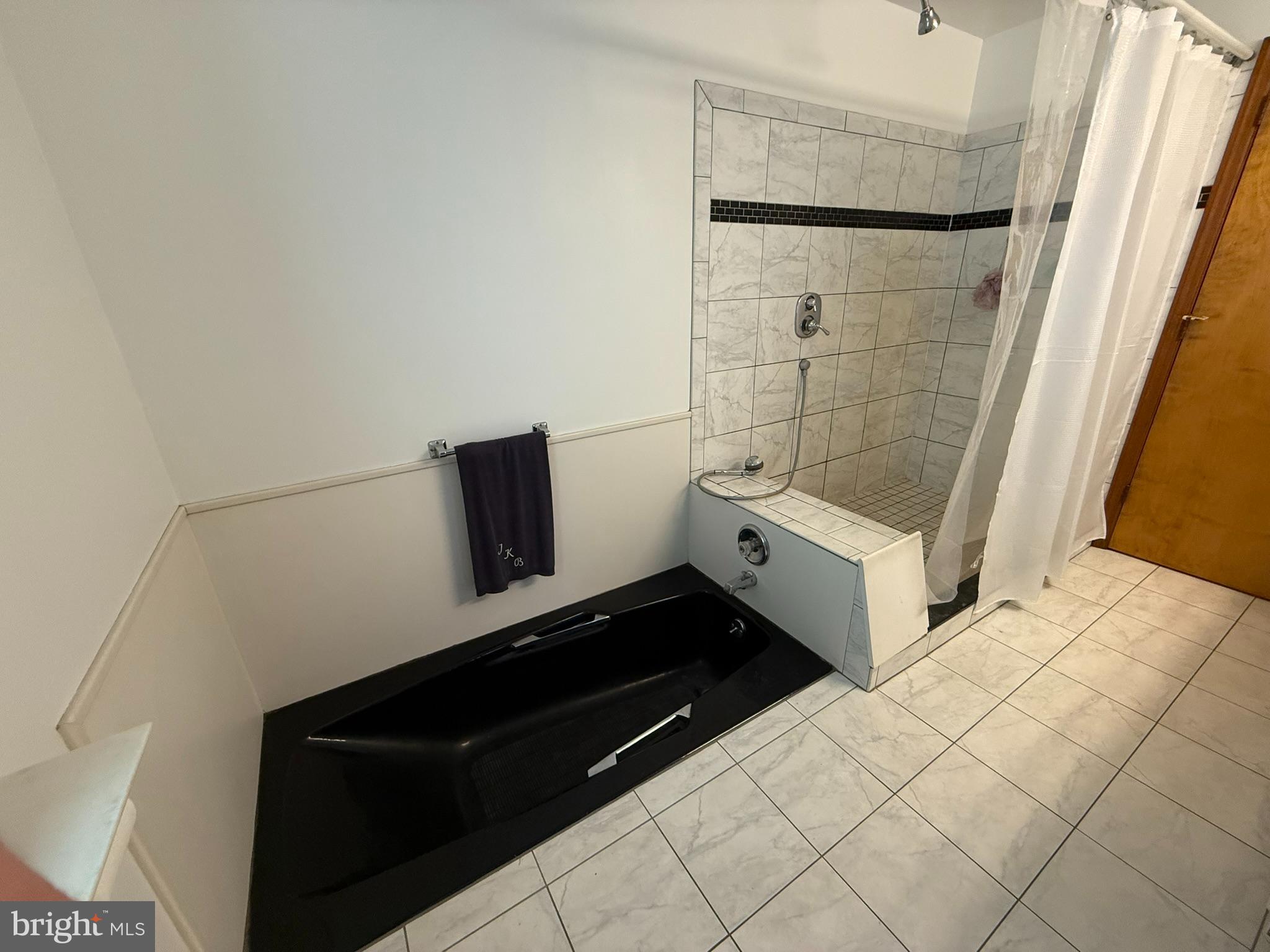 2140 Beaver Dam Road Honey Brook, PA 19344 - Photo 15 of 45 a bathroom with a sink and a mirror