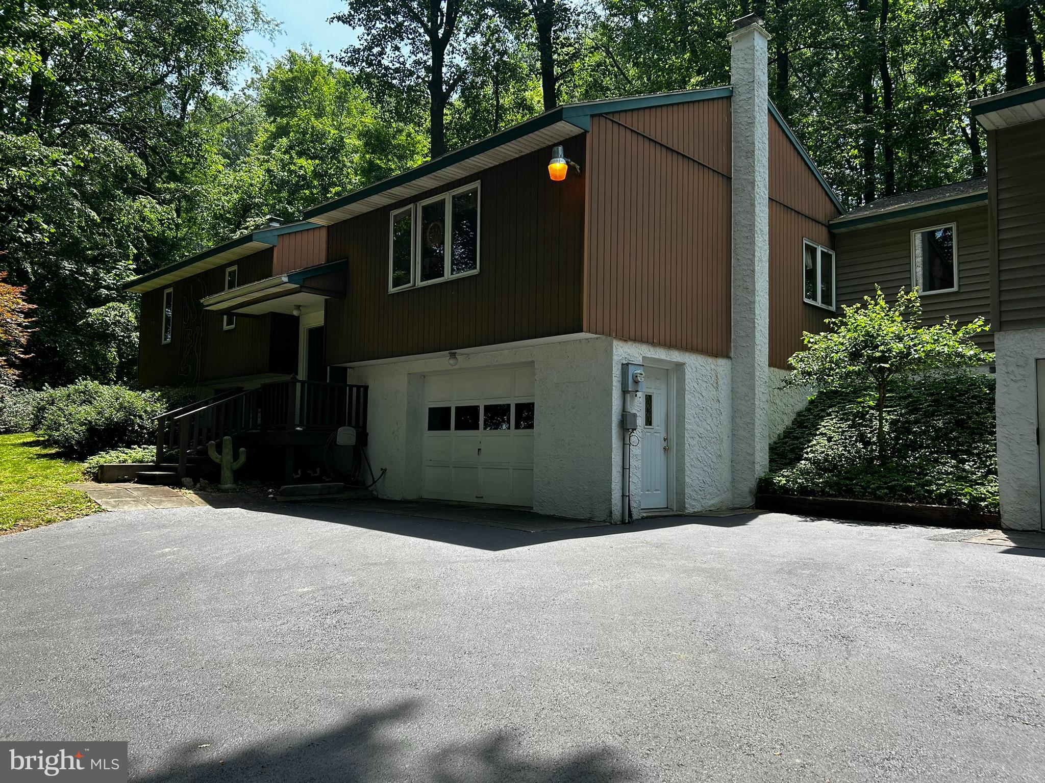 2140 Beaver Dam Road Honey Brook, PA 19344 - Photo 2 of 45 a front view of house with yard and trees in the background
