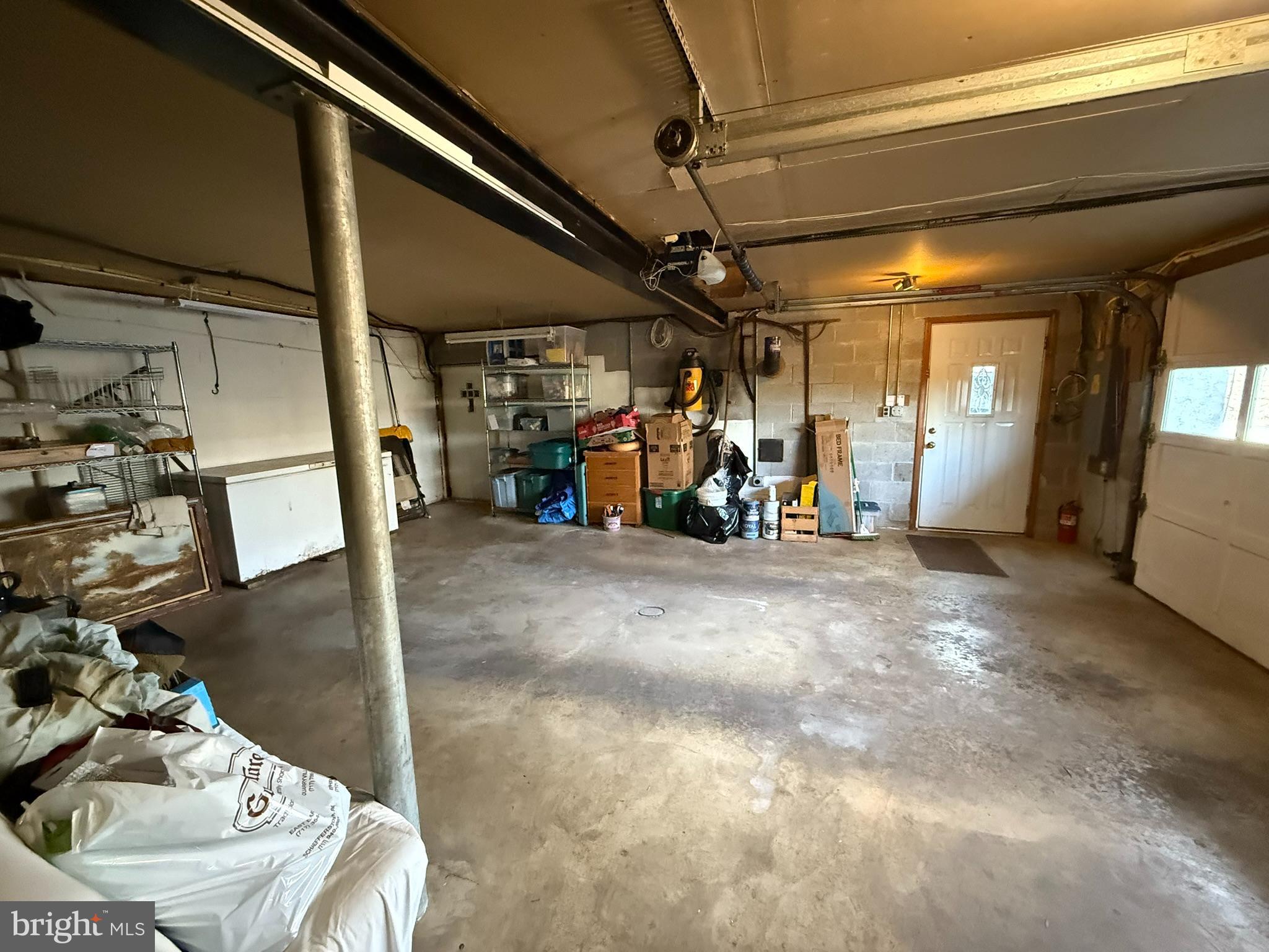 2140 Beaver Dam Road Honey Brook, PA 19344 - Photo 24 of 45 a view of a garage with a white car