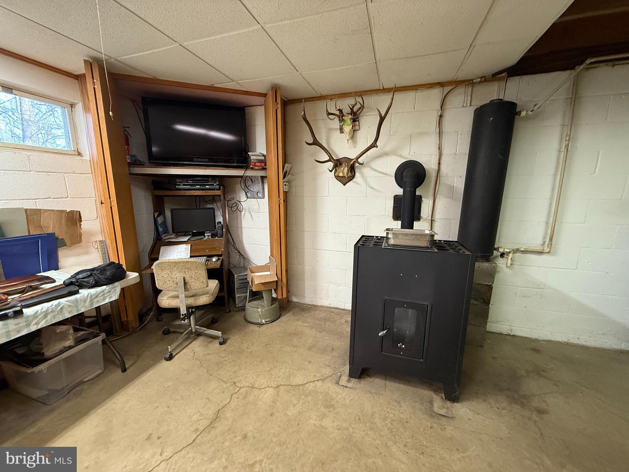 2140 Beaver Dam Road Honey Brook, PA 19344 - Photo 30 of 45 a living room with furniture and a flat screen tv