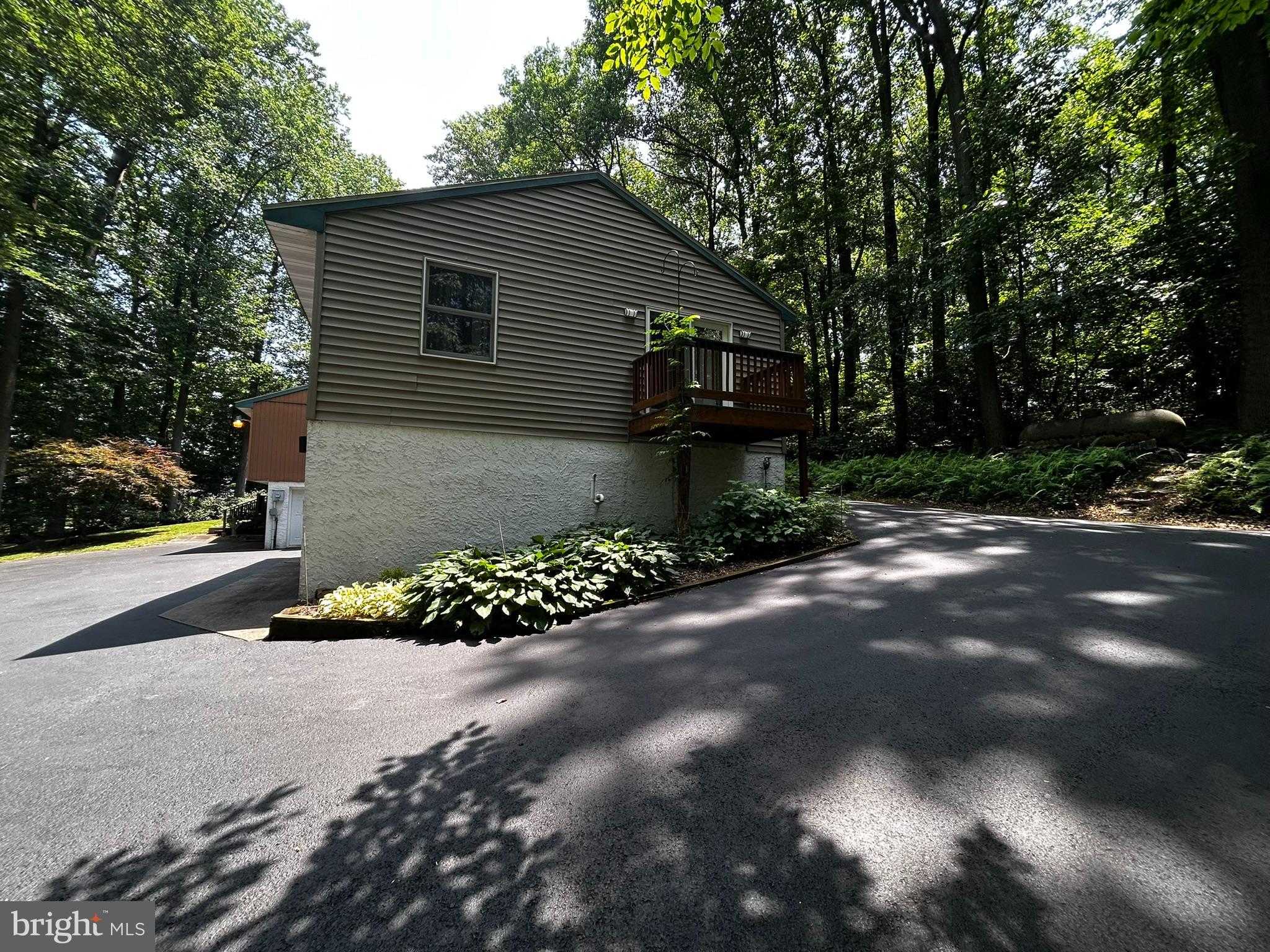 2140 Beaver Dam Road Honey Brook, PA 19344 - Photo 32 of 45 a front view of a house with a yard
