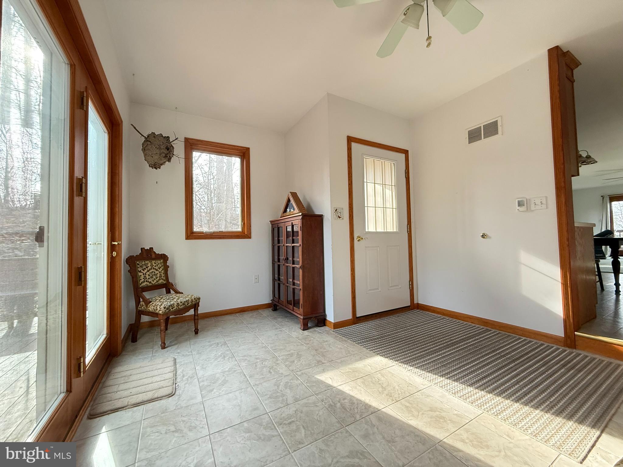 2140 Beaver Dam Road Honey Brook, PA 19344 - Photo 38 of 45 a view of an empty room with a window and hardwood floor