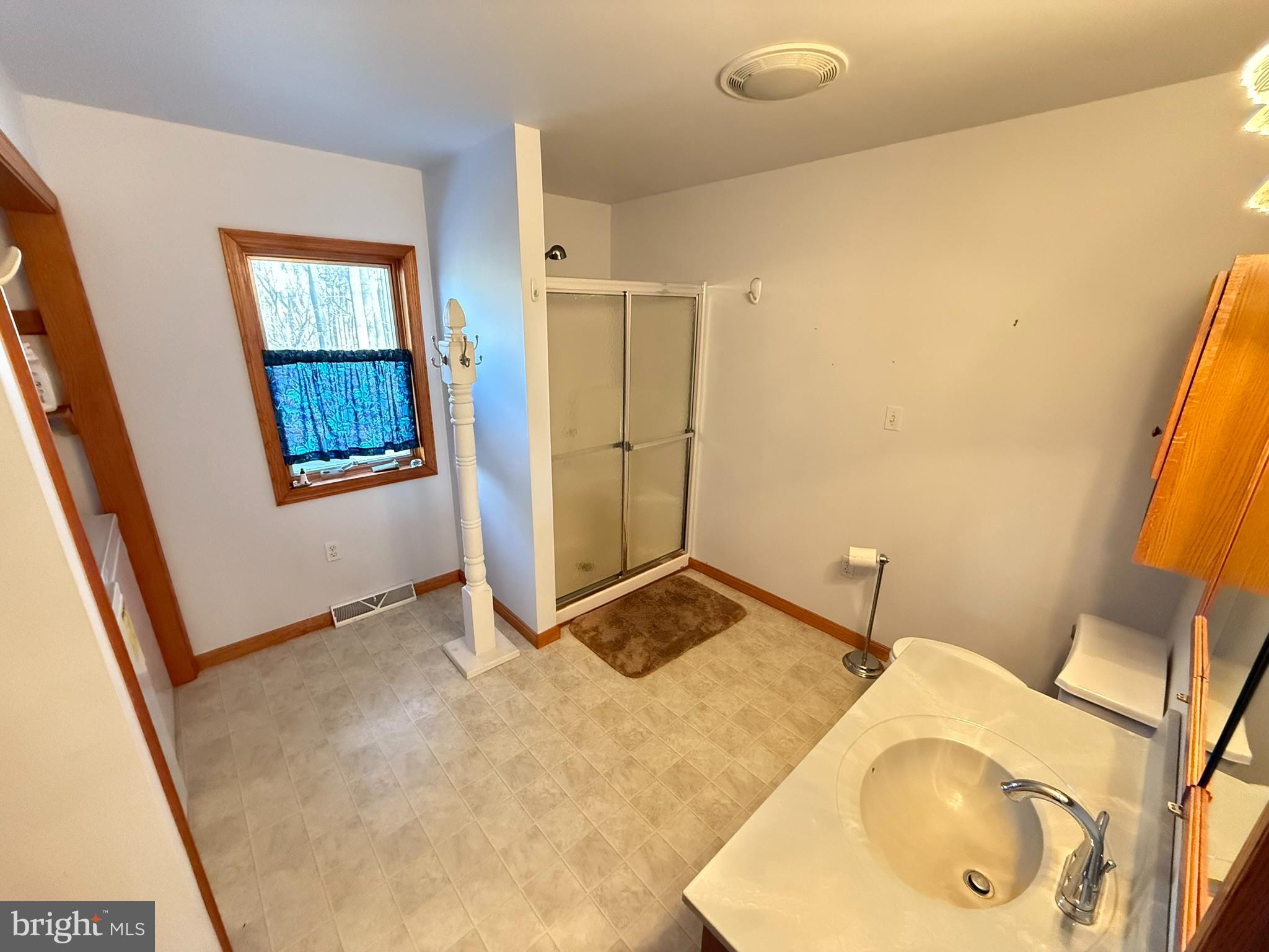 2140 Beaver Dam Road Honey Brook, PA 19344 - Photo 42 of 45 a bathroom with a sink and a mirror