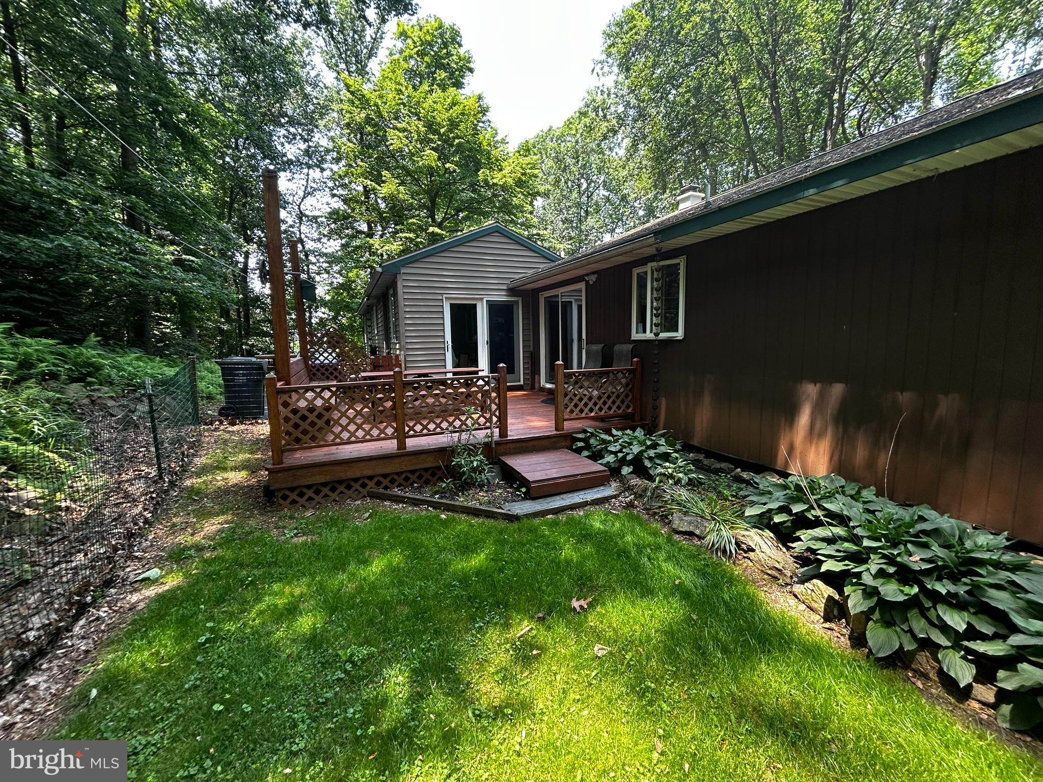 2140 Beaver Dam Road Honey Brook, PA 19344 - Photo 7 of 45 a view of a house with a backyard and a patio