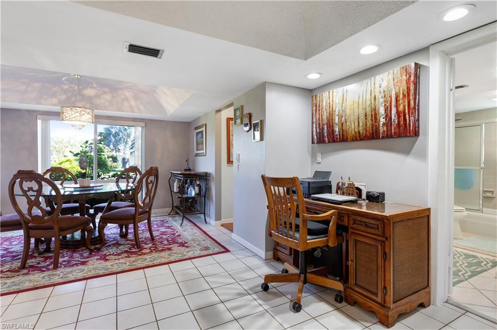 154 Penny Lane, Unit 7 Naples, FL 34112 - Photo 13 of 50 a view of a workspace with furniture