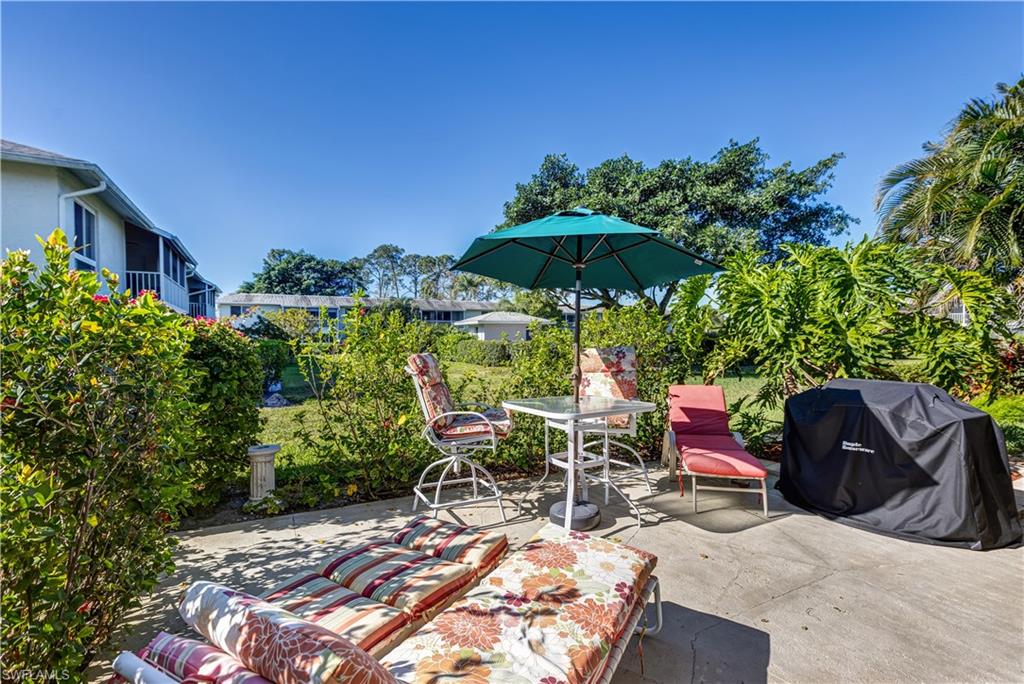 154 Penny Lane, Unit 7 Naples, FL 34112 - Photo 3 of 50 a view of outdoor space yard and patio