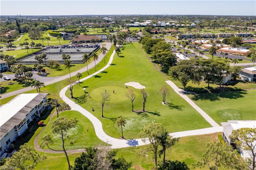 154 Penny Lane, Unit 7 Naples, FL 34112 - Photo 44 of 50 a view of a swimming pool