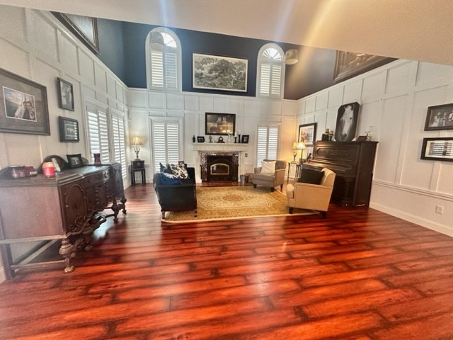 7470 Smith Chapel Road Cookeville, TN 38501 - Photo 11 of 70 a living room with furniture wooden floor and a fireplace