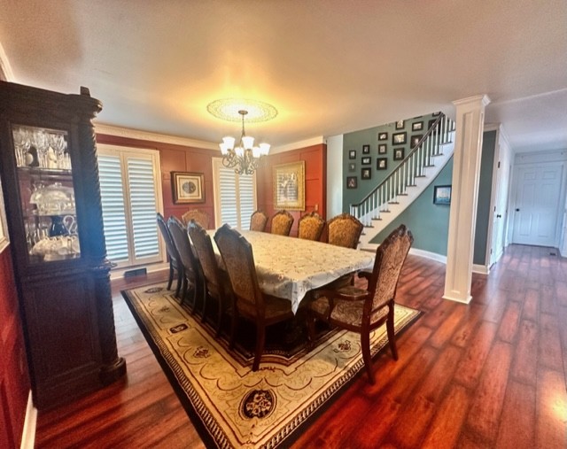 7470 Smith Chapel Road Cookeville, TN 38501 - Photo 14 of 70 a view of a dining room with furniture wooden floor and chandelier