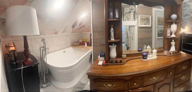 7470 Smith Chapel Road Cookeville, TN 38501 - Photo 31 of 70 a bathroom with a sink and mirror with bathtub
