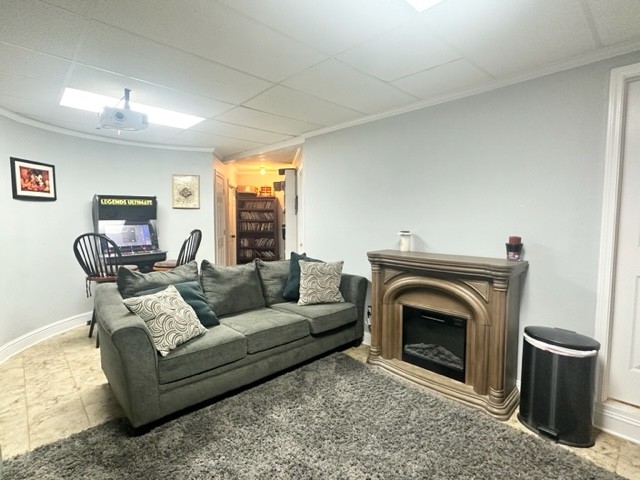 7470 Smith Chapel Road Cookeville, TN 38501 - Photo 33 of 70 a living room with furniture a window and a fireplace
