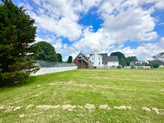 7470 Smith Chapel Road Cookeville, TN 38501 - Photo 39 of 70 a view of yard with swimming pool and green space