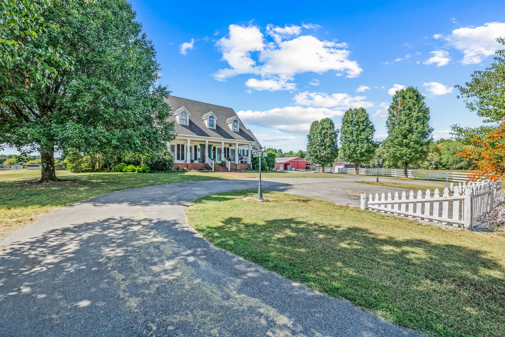 7470 Smith Chapel Road Cookeville, TN 38501 - Photo 4 of 70 a house view with garden space and trees