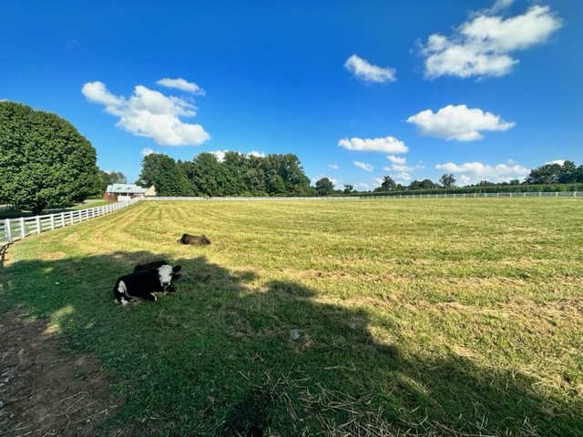 7470 Smith Chapel Road Cookeville, TN 38501 - Photo 43 of 70 a view of a lake in the sunset