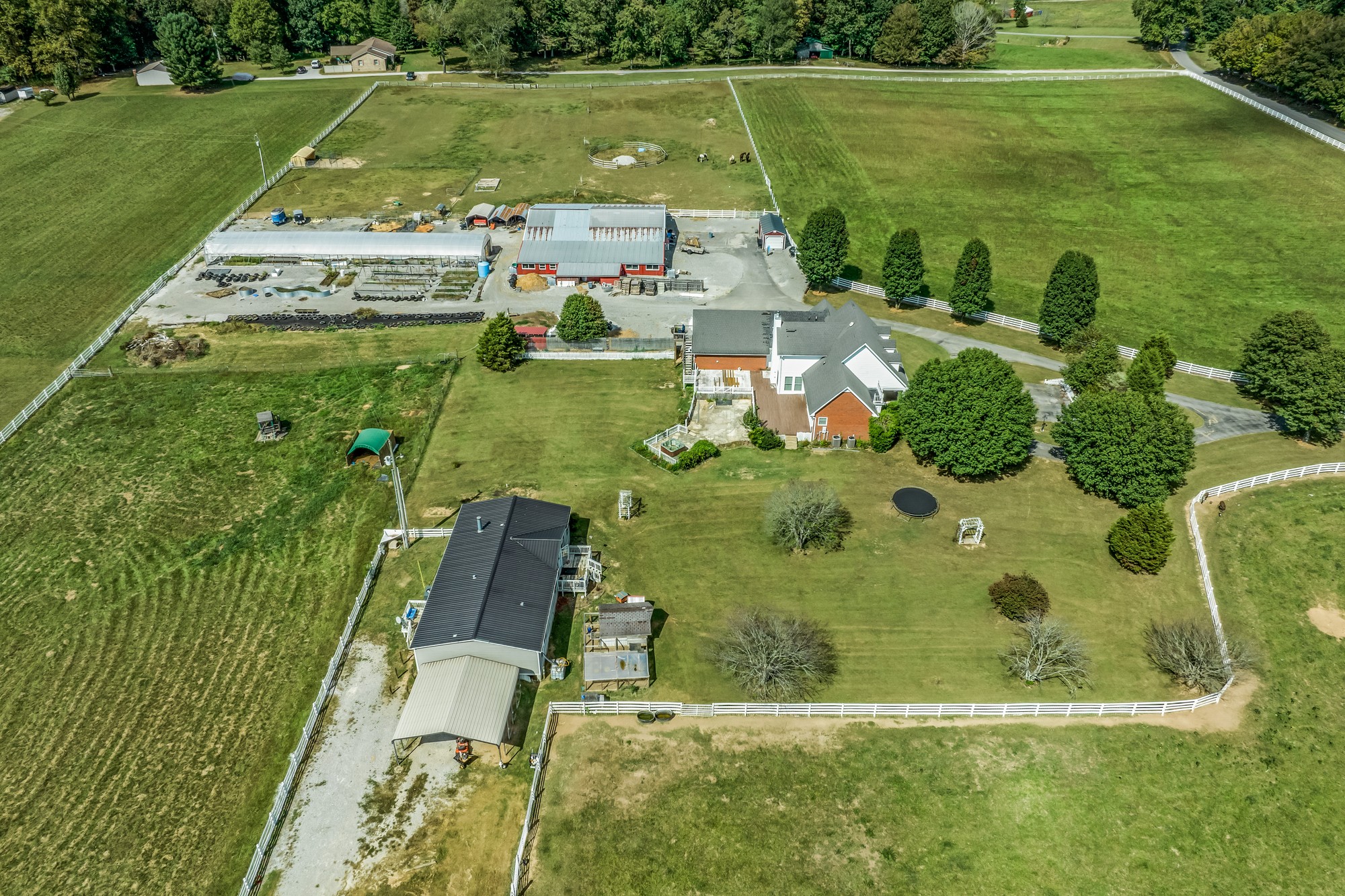 7470 Smith Chapel Road Cookeville, TN 38501 - Photo 58 of 70 an aerial view of a residential houses with outdoor space and trees