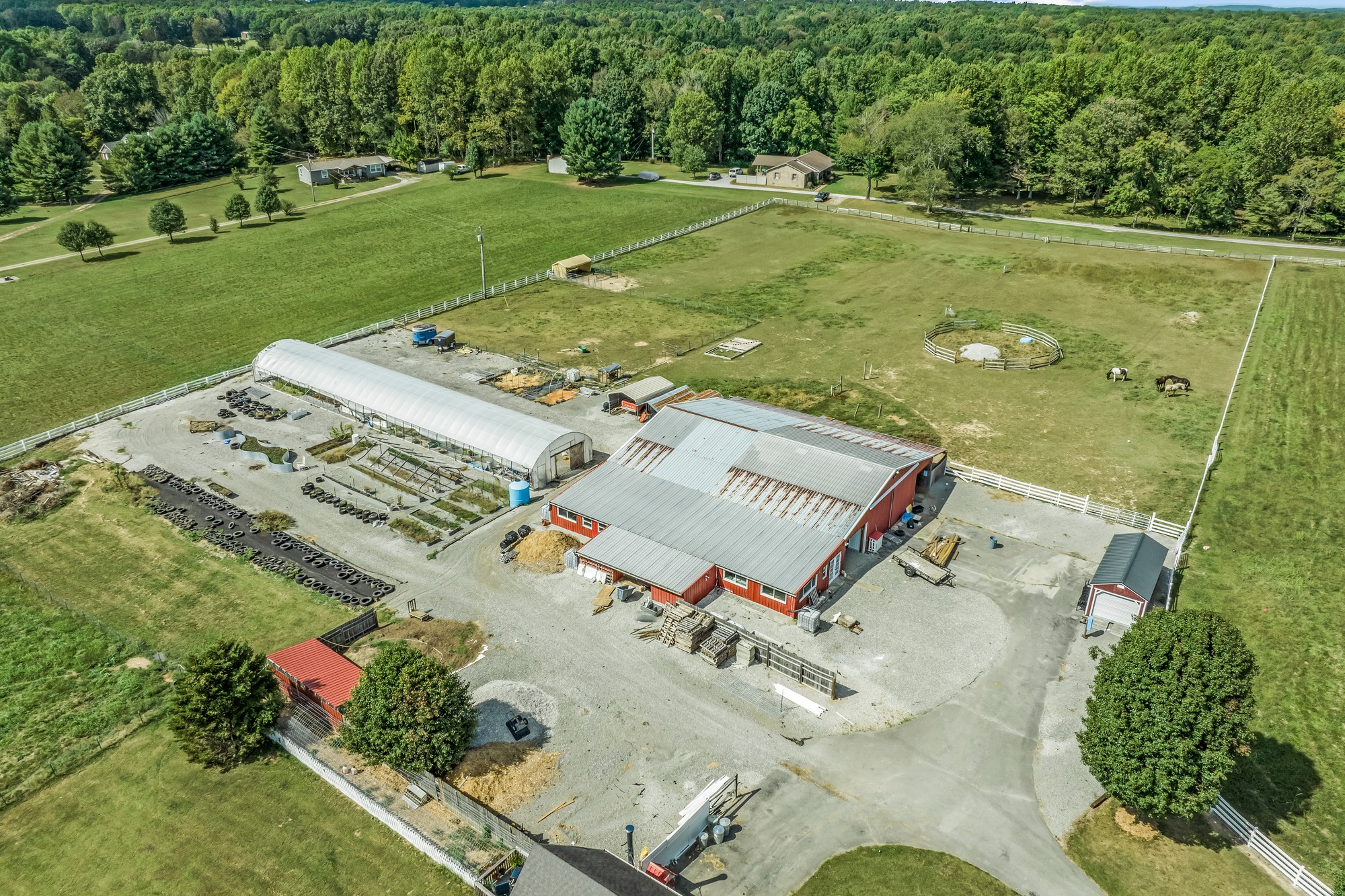 7470 Smith Chapel Road Cookeville, TN 38501 - Photo 59 of 70 an aerial view of a house with a yard
