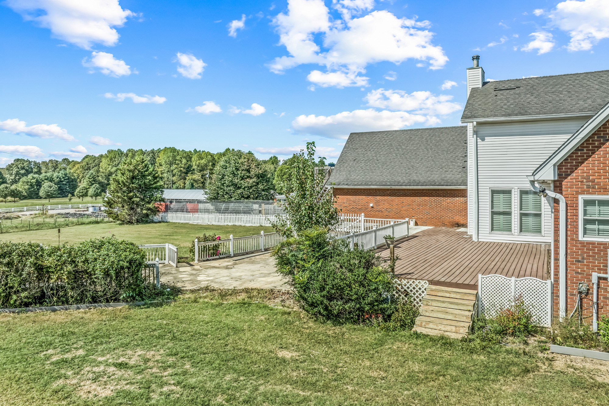 7470 Smith Chapel Road Cookeville, TN 38501 - Photo 69 of 70 a front view of a house with a yard