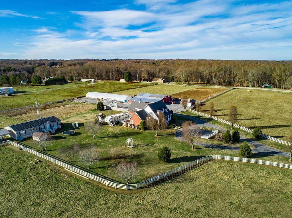 7470 Smith Chapel Road Cookeville, TN 38501 - Photo 8 of 70 an aerial view of a golf course with chairs