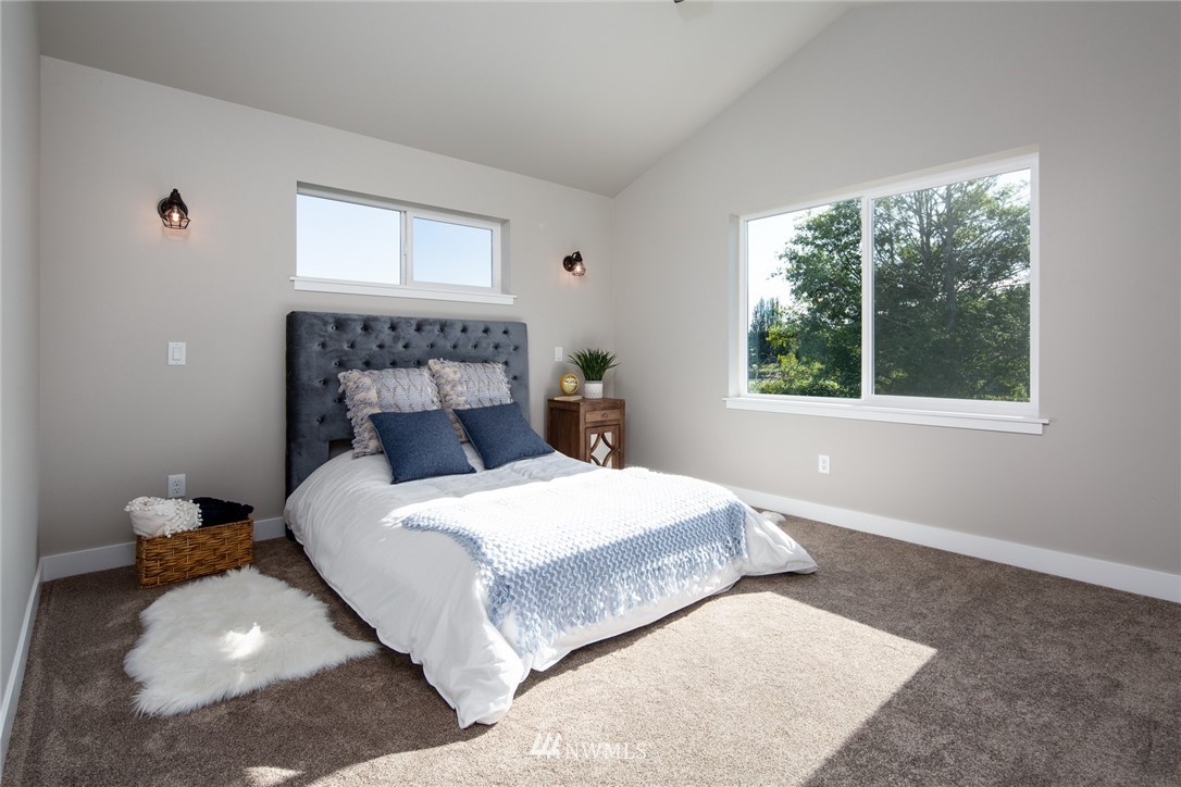 5572 South Church Road Ferndale, WA 98248 - Photo 12 of 30 a bedroom with a bed and window