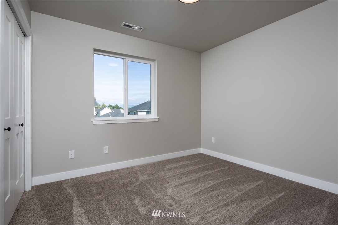 5572 South Church Road Ferndale, WA 98248 - Photo 21 of 30 an empty room with windows