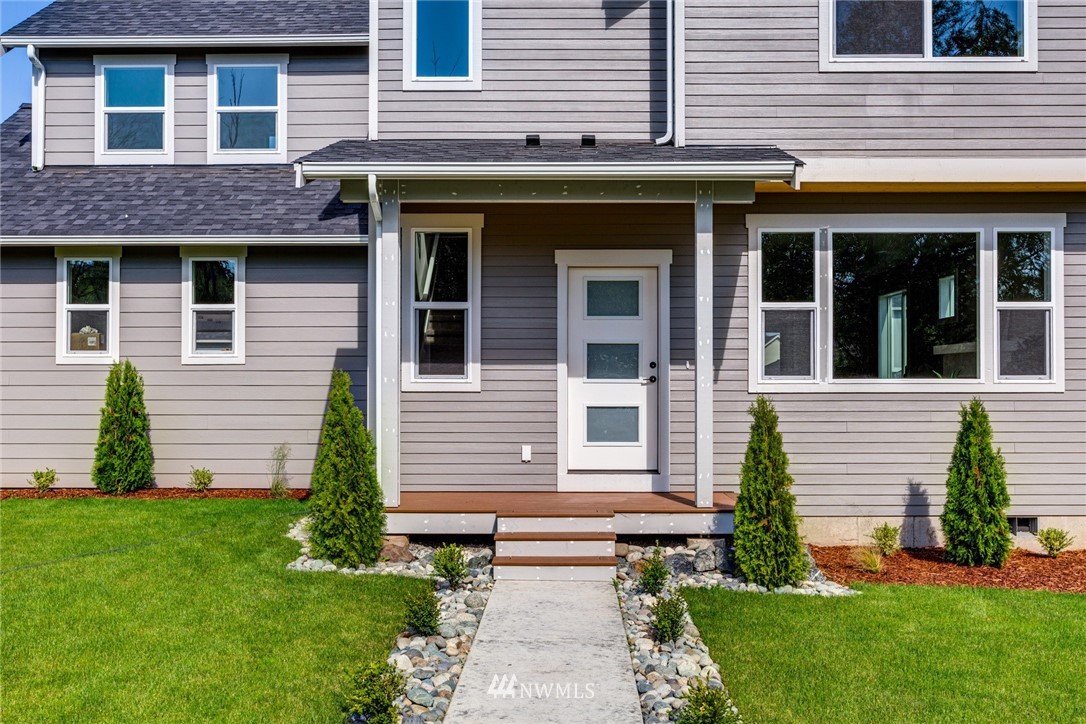 5572 South Church Road Ferndale, WA 98248 - Photo 24 of 30 a front view of a house with a garden