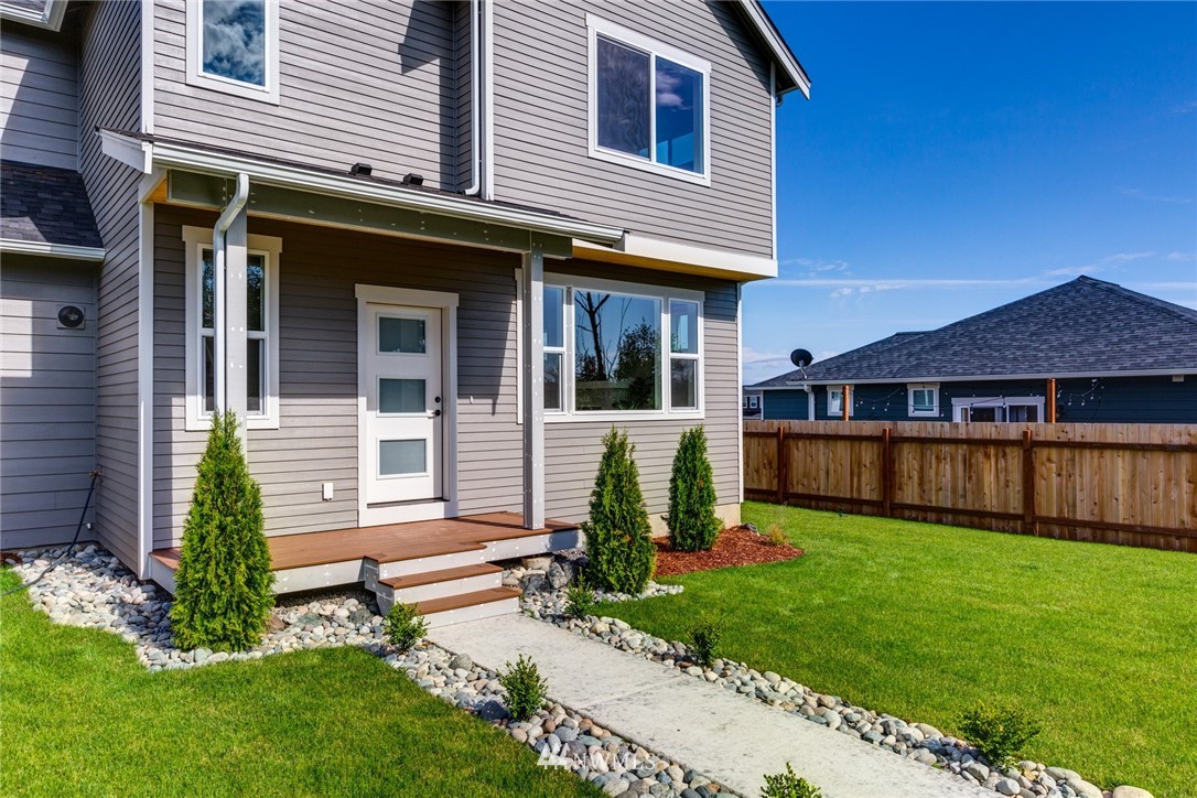 5572 South Church Road Ferndale, WA 98248 - Photo 26 of 30 a view of a house with a yard porch and sitting area
