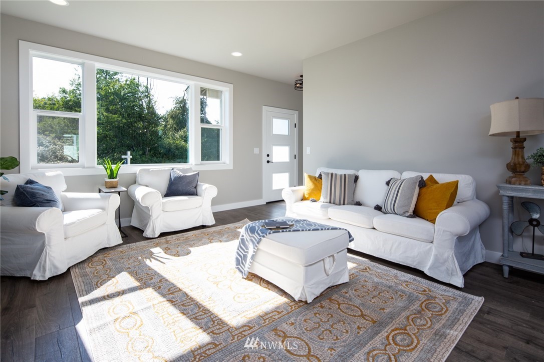5572 South Church Road Ferndale, WA 98248 - Photo 4 of 30 a living room with furniture and a large window