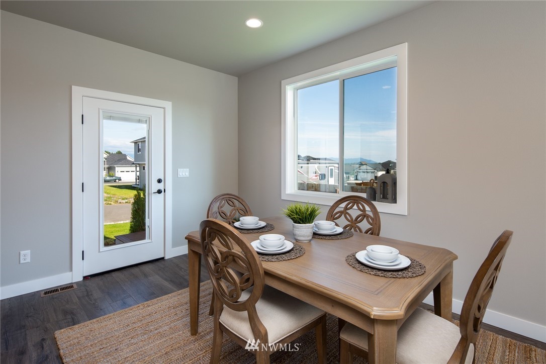 5572 South Church Road Ferndale, WA 98248 - Photo 9 of 30 a view of a dining room with furniture and window