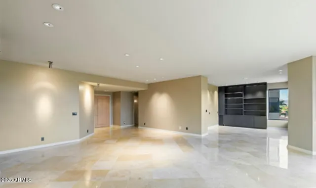 a large bathroom with a large tub and sink