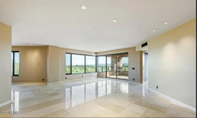 a kitchen with stainless steel appliances a stove and a refrigerator