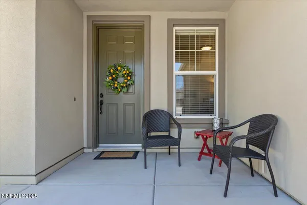 a bathroom with a sink a toilet and shower curtain