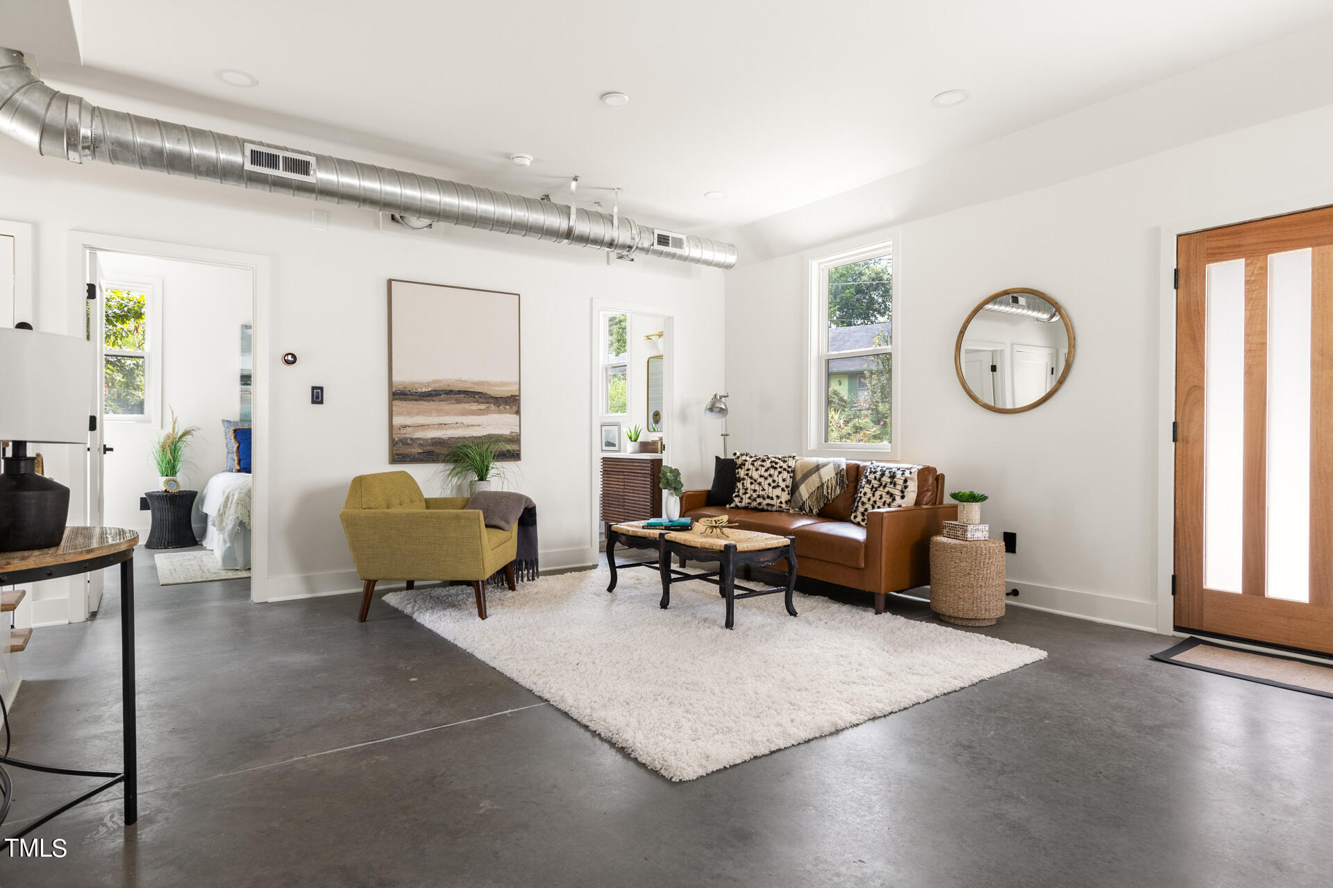 2909 Herring Boulevard Durham, NC 27704 - Photo 12 of 47 a living room with furniture window and wooden floor