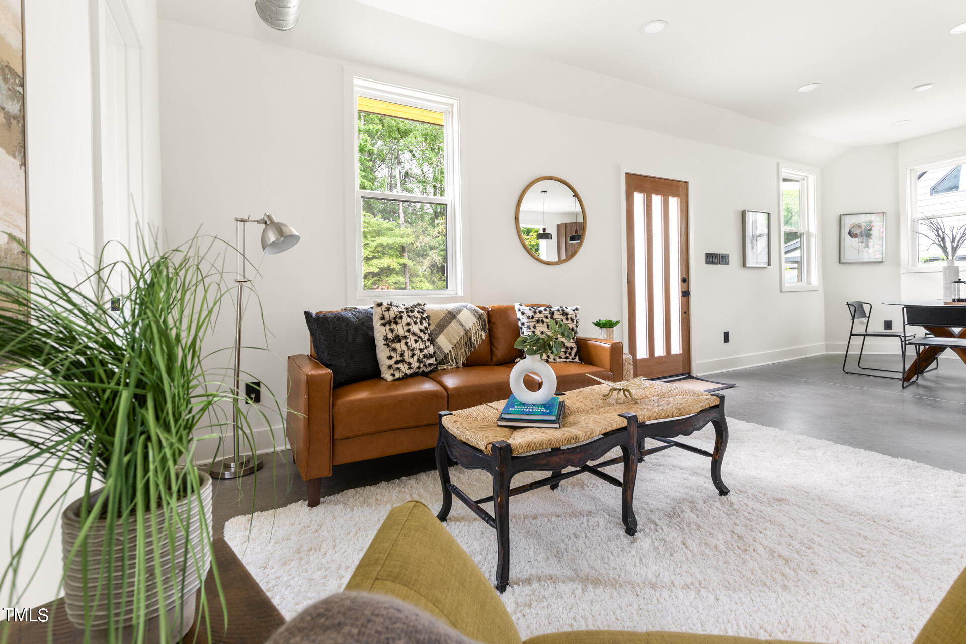 2909 Herring Boulevard Durham, NC 27704 - Photo 16 of 47 a living room with furniture potted plant and window