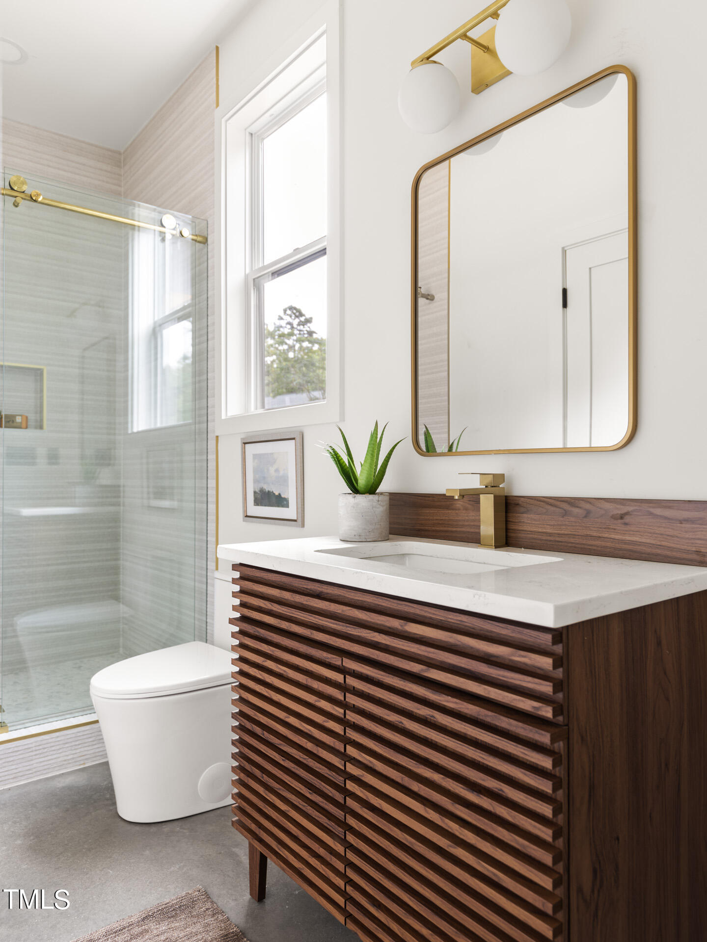 2909 Herring Boulevard Durham, NC 27704 - Photo 25 of 47 a bathroom with a sink and a mirror