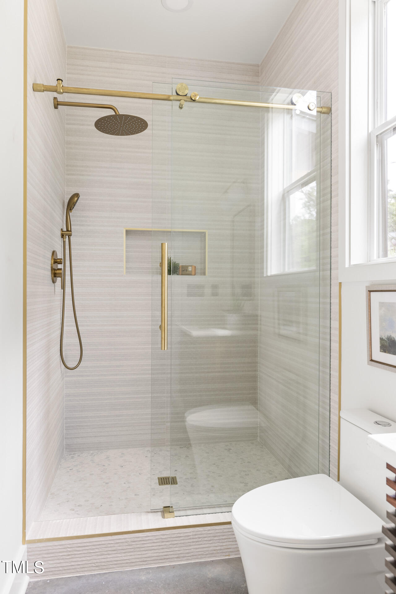 2909 Herring Boulevard Durham, NC 27704 - Photo 27 of 47 a bathroom with a shower and toilet