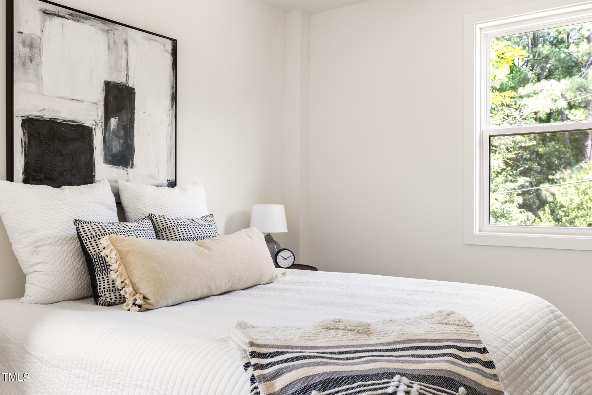 2909 Herring Boulevard Durham, NC 27704 - Photo 31 of 47 a bedroom with a large bed and a window