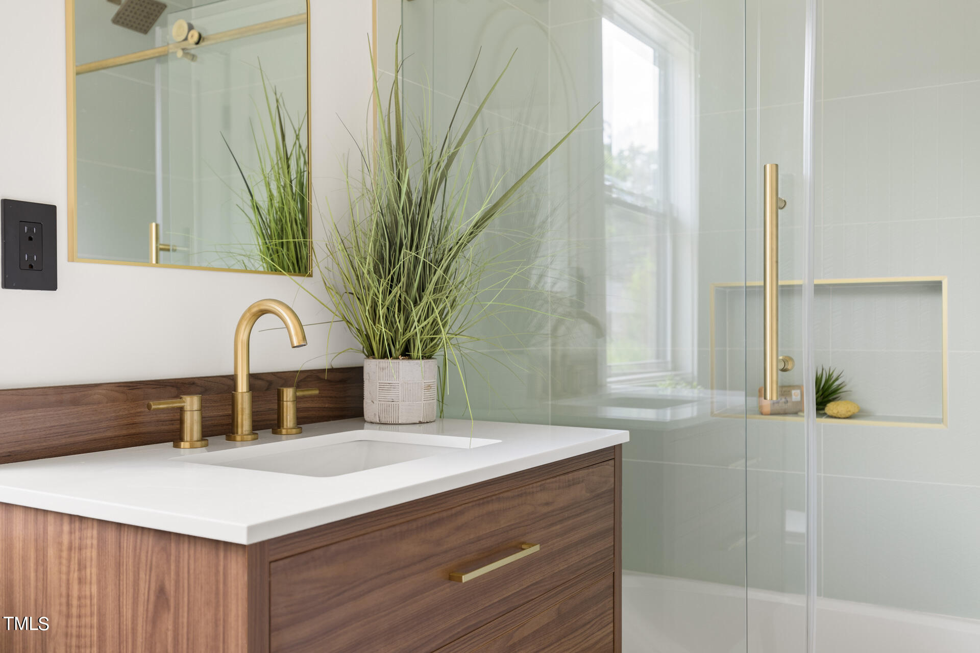 2909 Herring Boulevard Durham, NC 27704 - Photo 37 of 47 a kitchen with a sink and a potted plant
